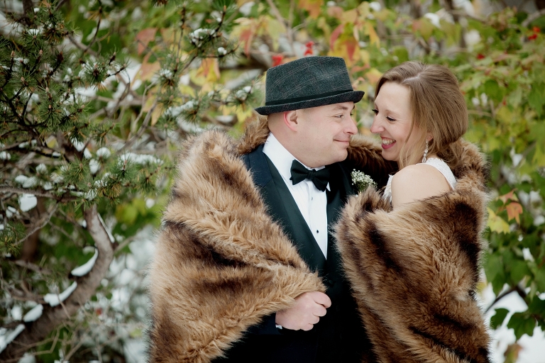 bride and groom on the grounds of Edmonton legislature building